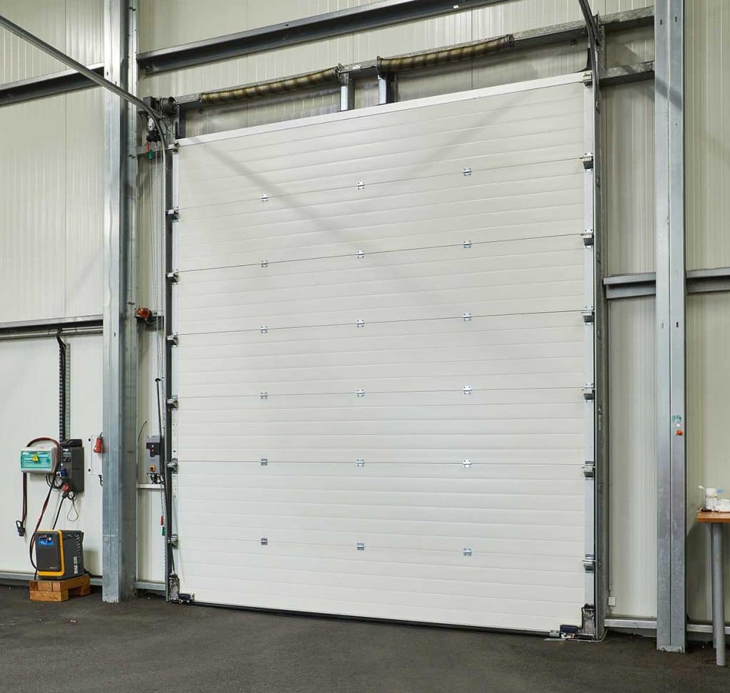 Porte industrielle pour la logistique dans un bâtiment - NEXTENSIA Porte industrielle pour la logistique dans un bâtiment