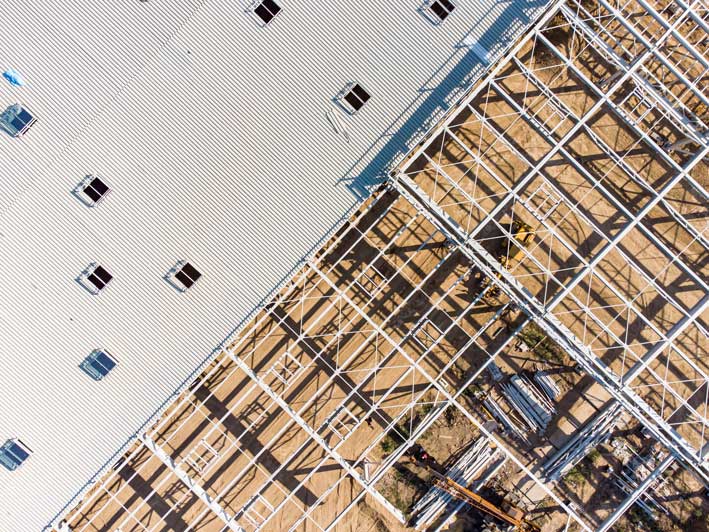 Les-bâtiments-industriels-démontables-offrent-une-plus-grande-souplesse-en-termes-de-conformité-aux-réglementations - NEXTENSIA Les-bâtiments-industriels-démontables-offrent-une-plus-grande-souplesse-en-termes-de-conformité-aux-réglementations